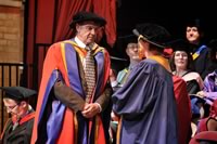 Receiving his honorary doctorate
