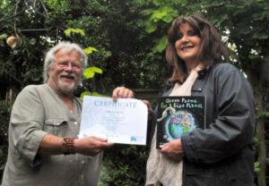 Photograph of Bill Oddie presenting Sally Peberday with her prize. © Chris Jenkin / Enterprise Plants.