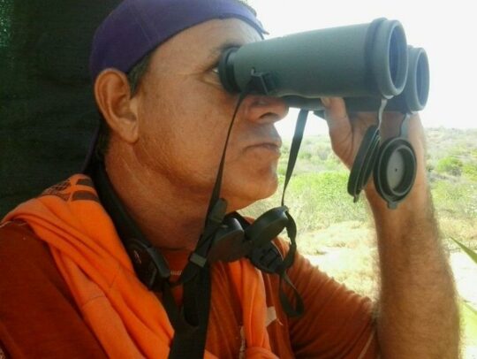 Ranger Pablo Millán using SWAROVSKI OPTIK binoculars
