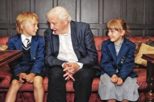 Young schoolchildren meet their inspiring hero Sir David Attenborough