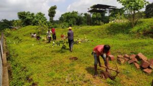 A photograph of tree planters at one of AERF's project sites in India.