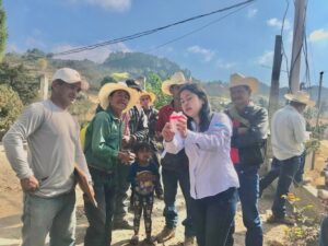 An AESMO technician with residents