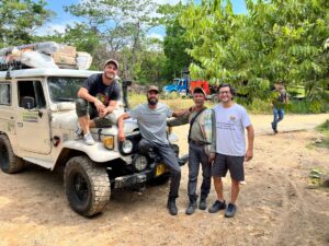 FBC team members, including Santiago Rosado, pictured by one of their vehicles in the reserve.