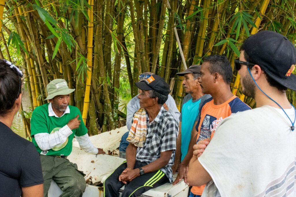 A photo of FBC's Regional Environmental Leader Julio Marín-Cruz discussing conservation aims with members of the local community.