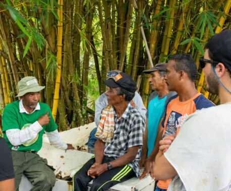 A photo of FBC's Regional Environmental Leader Julio Marín-Cruz discussing conservation aims with members of the local community.