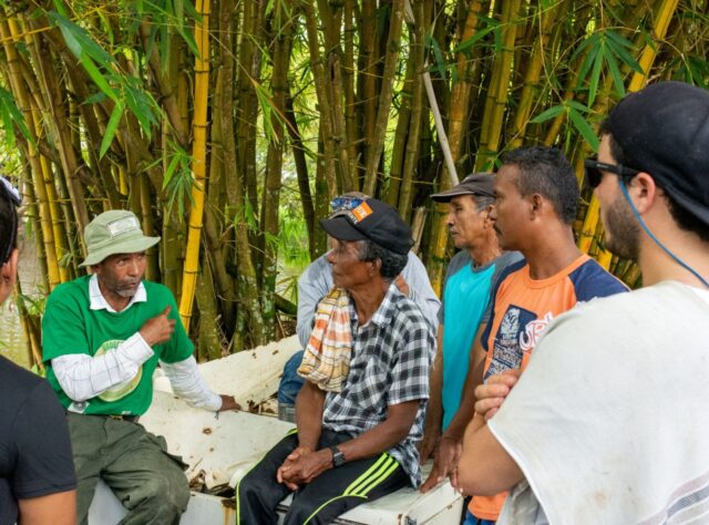 A photo of FBC's Regional Environmental Leader Julio Marín-Cruz discussing conservation aims with members of the local community.